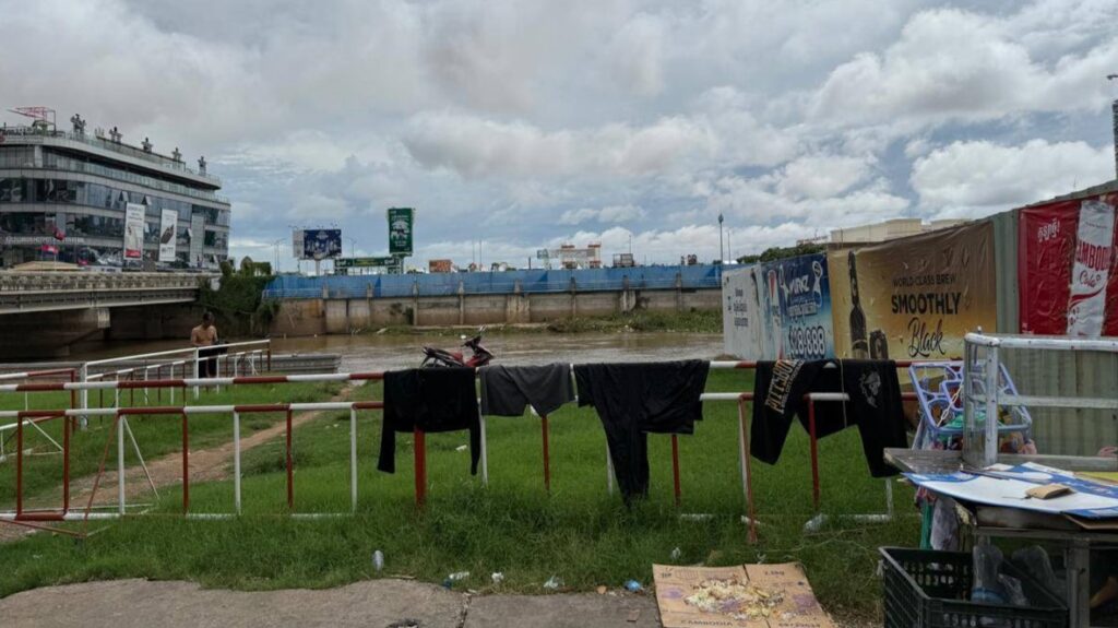 A patch of concrete that used to be the old Rainbow Bridge, which was torn down after the tragic crowd crush of 2010, captured next to Phnom Penh's Koh Pich island on Nov. 6, 2025. (Ly Lin/Mekong Independent)