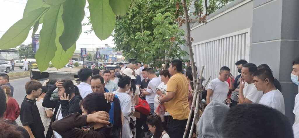 A crowd of clients from Huione Pay and H Pay gather in front of the National Bank of Cambodia headquarters during a protest in Phnom Penh on April 24, 2026. (Danielle Keeton-Olsen/Mekong Independent/Creative Commons)