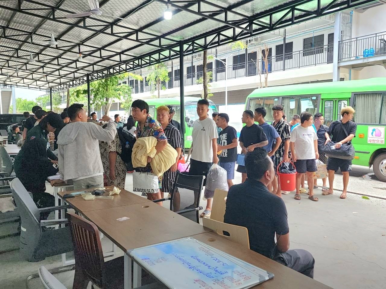 Foreigners wait in line for processing by Immigration Department officials, in a photo posted to the Mondulkiri Provincial Police's Facebook page on June 7, 2026.