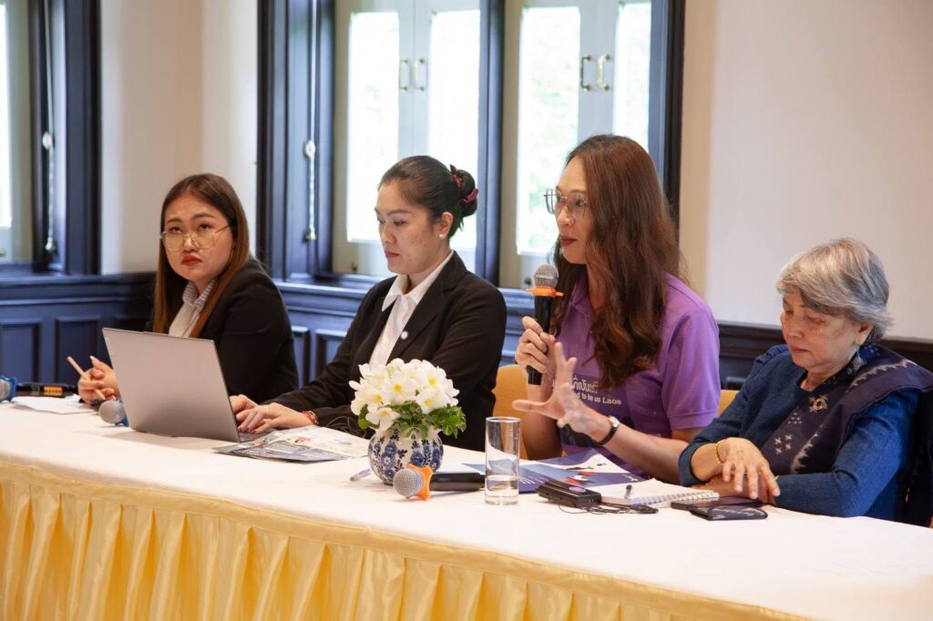 Thavadxai Xaiyakoumman, 36, holds a microphone to speak during a cross-border workshop among Lao and Thai lawyers and civil society about addressing sexual and gender-based violence in March 2026. (Supplied)
