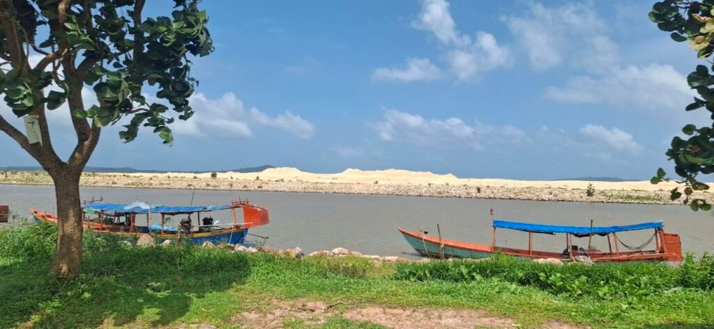 A shoreline where fishers can dock outside the Canopy Sands development zone, which fishers say was a rich fishing area before the development, on July 10, 2026. (Danielle Keeton-Olsen/Mekong Independent/Creative Commons)