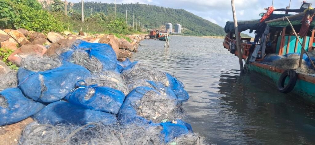 A shoreline where fishers can dock outside the Canopy Sands development zone, which fishers say was a rich fishing area before the development, on July 10, 2026. (Danielle Keeton-Olsen/Mekong Independent/Creative Commons)