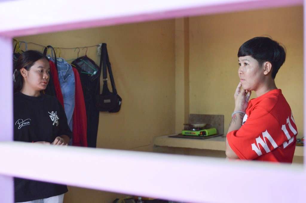 Ourn Sreylai and Keo Chantha, two workers who recently moved from Banteay Meanchey province, share a rent room outside the capital as they took new jobs in a factory on the outskirts of Phnom Penh, in a photo captured on August 23, 2026. (Sineat Yon/Mekong Independent)